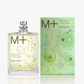 A clear rectangular perfume bottle with a silver cap next to its matching green and light green box. Both the bottle and box feature the text 'M+' and 'Molecule 01 + Clary Sage' with abstract circular and linear graphic designs.