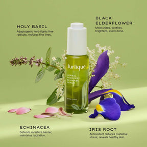 Jurlique Herbal Recovery Bi-Phase Serum bottle with flowers on a green background