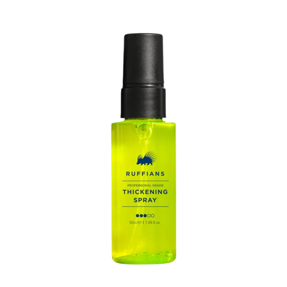 A bottle of Ruffians Thickening Spray with a black pump dispenser and a bright neon yellow-green liquid inside, shown on a plain white background.